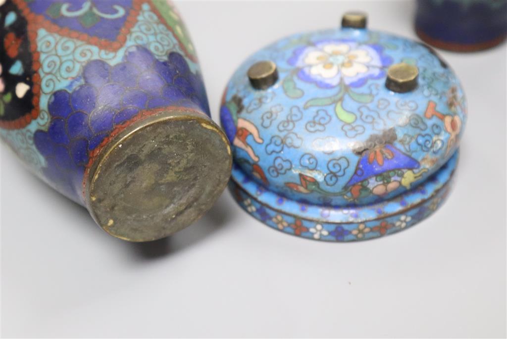 A pair of Chinese cloisonne vases and a similar small bowl